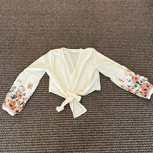 This cute Blouse is from SHEIN. It’s very comfortable. Looks great with jeans!